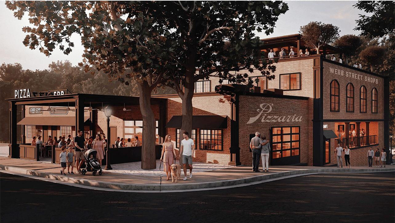 Artist rendering of the Phase II corner at dusk with a covered patio and the Webb Street Shops building